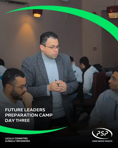 PSP trainer engaging with young engineers during hands-on leadership development workshop.